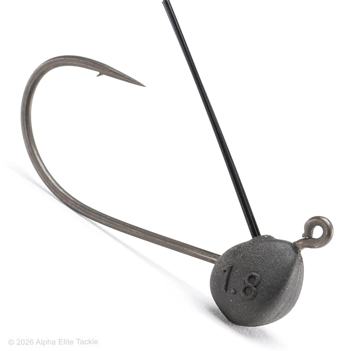 A close-up studio shot of a fishing jig head on a white background, featuring a dark gray textured metal weight with the number '1.8' embossed, a black wire shaft, and a curved silver hook.