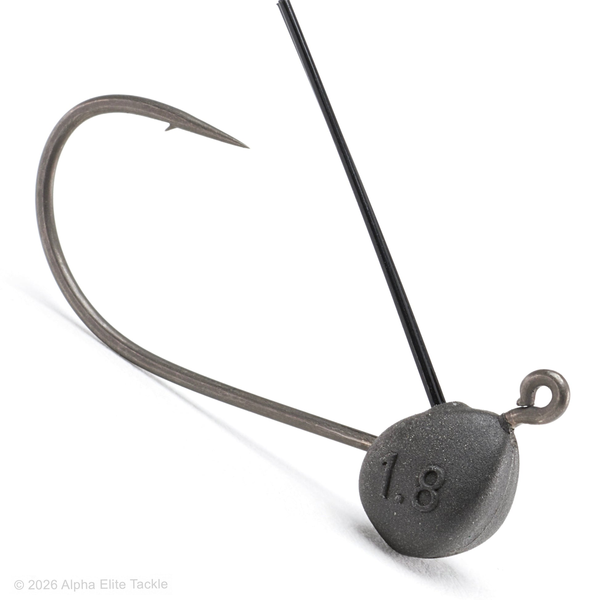 A close-up studio shot of a fishing jig head on a white background, featuring a dark gray textured metal weight with the number '1.8' embossed, a black wire shaft, and a curved silver hook.