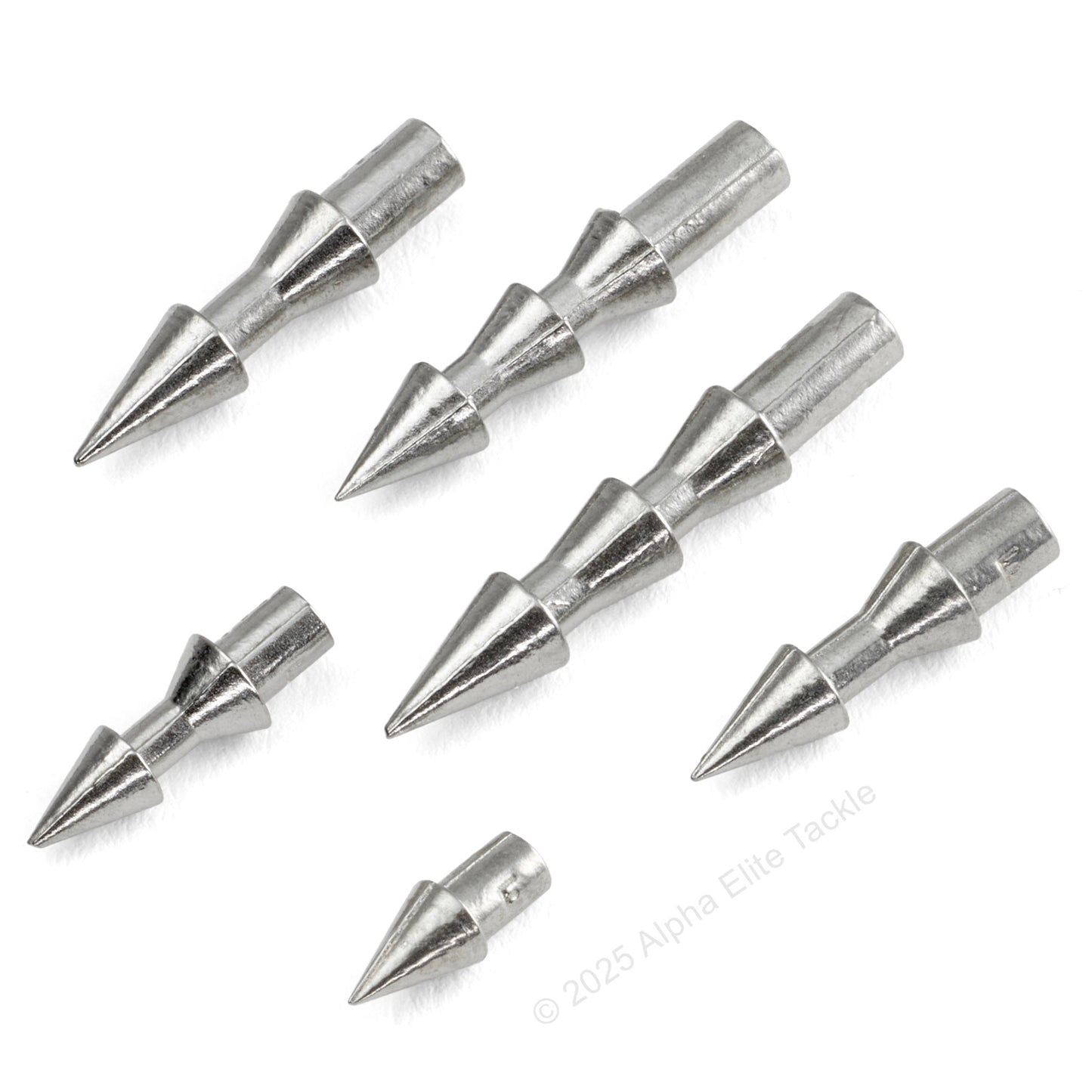 Close up of 6 of Valley Hill TG 18 tungsten nail sinkers on a white background.