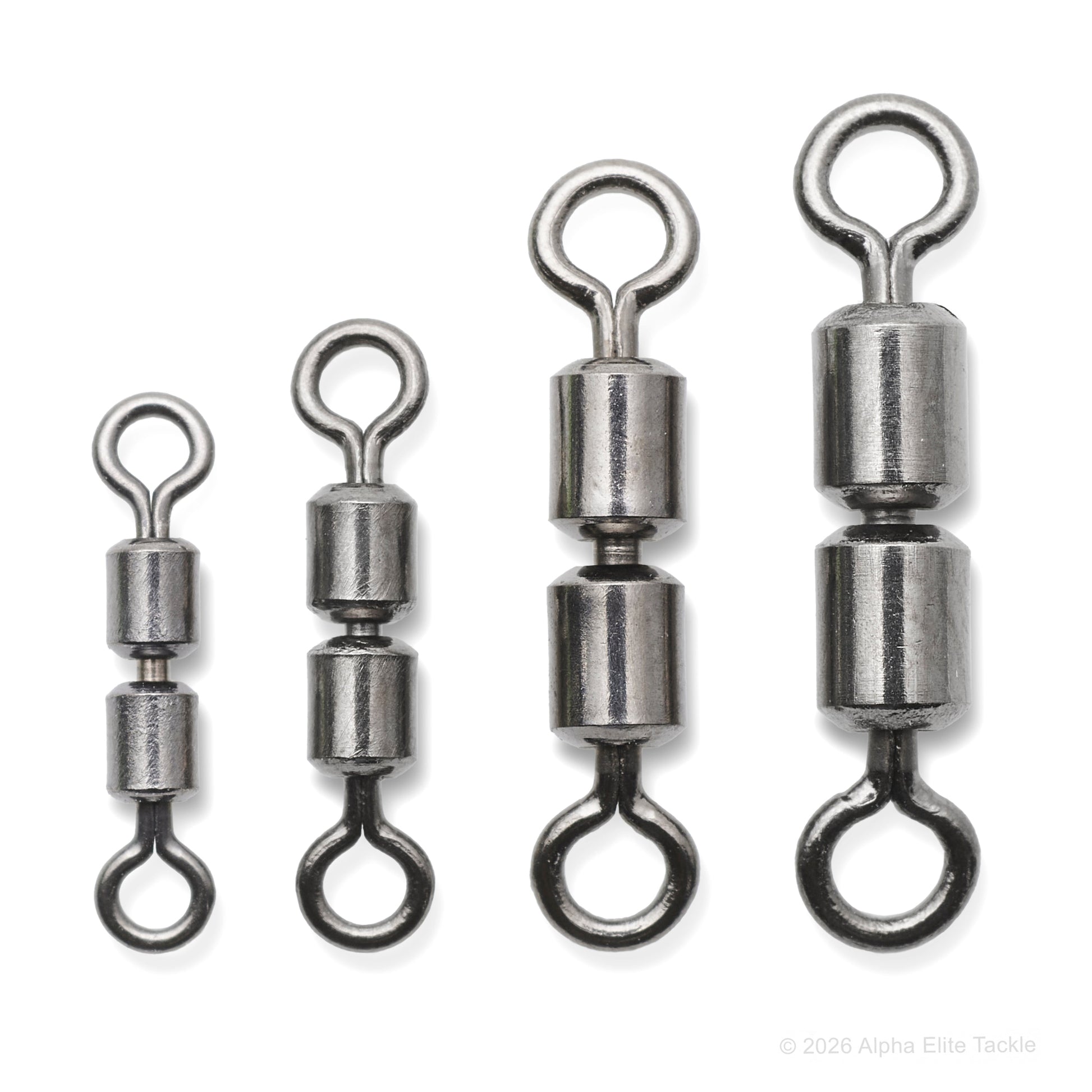 Four metal fishing swivels on a white background