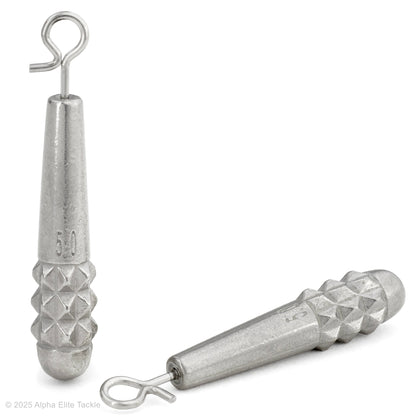 Close up of two Varivas TG Slim Sinker Quick Change weights on a white background.