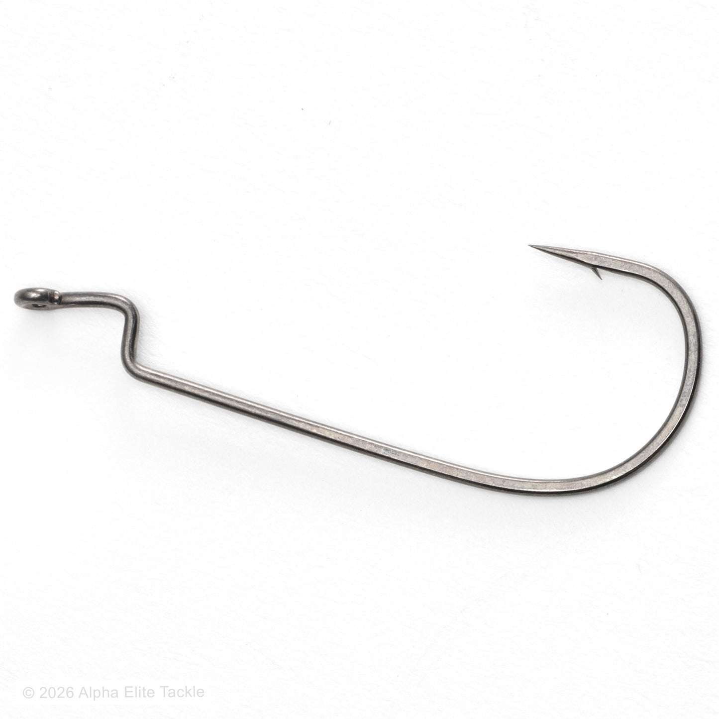 Metallic fishing hook on a white background