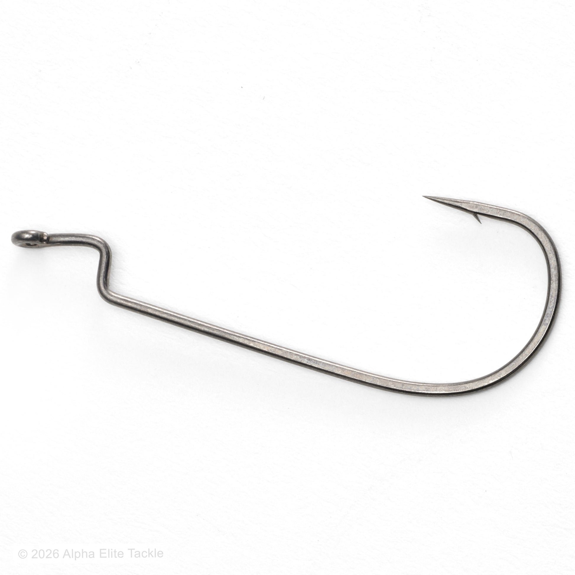 Metallic fishing hook on a white background